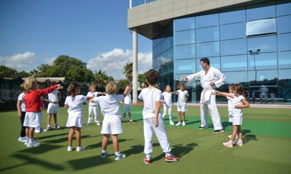 circle-of-kids-punching-scaled-600×400-1